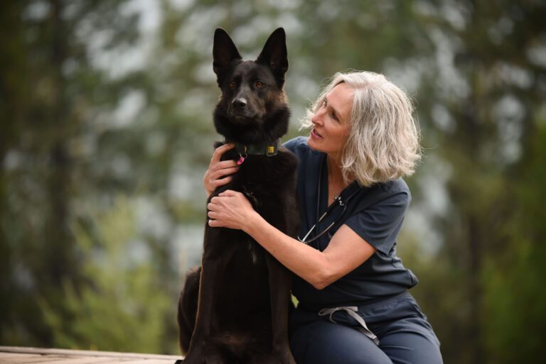 Dr. Denise Lowing sharing a quiet moment with her dog